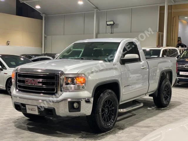 GMC  Sierra  SLE  2015  Pick Up  Automatic  8  105,000  4WD  Silver  Gasoline