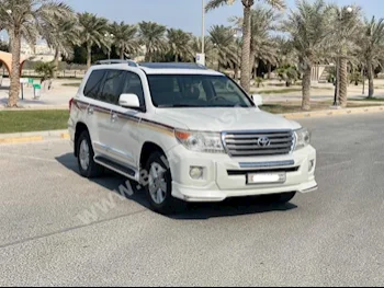 Toyota  Land Cruiser  GXR  2013  SUV  Automatic  8  145,100  AWD  White  Gasoline
