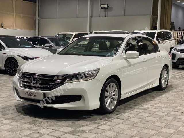 Honda  Accord  2015  Sedan  Automatic  4  72,000  FWD  White  Gasoline