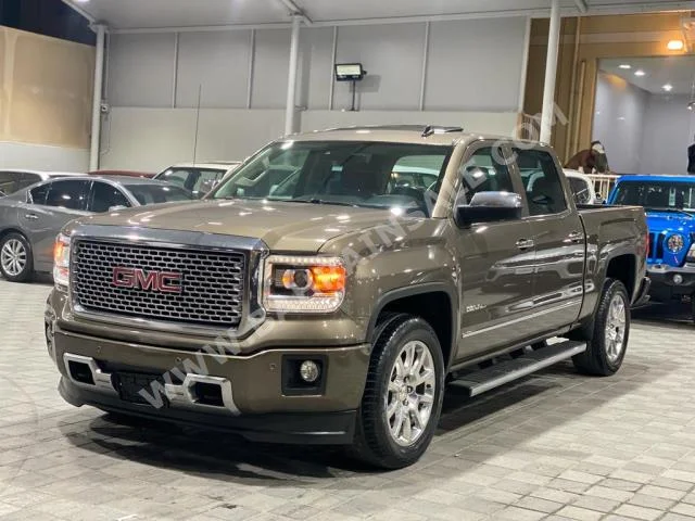 GMC  Sierra  Denali  2015  Pick Up  Automatic  8  100,000  4WD  Gold  Gasoline