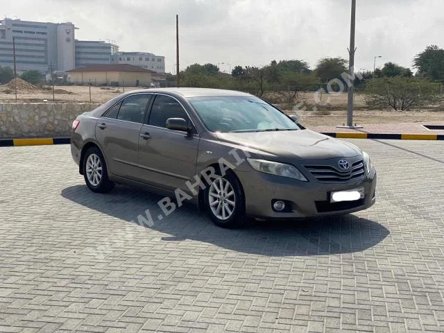 Toyota  Camry  GLX  2011  Sedan  Automatic  4  199,600  FWD  Gray  Gasoline