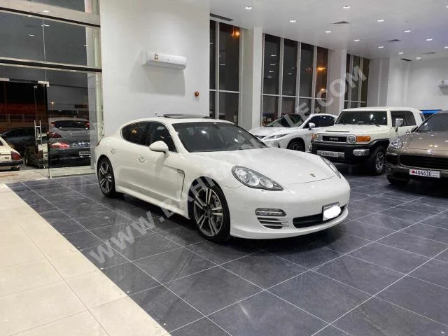 Porsche  Panamera  4S  2011  Sedan  Automatic  8  103,900  RWD  White  Gasoline