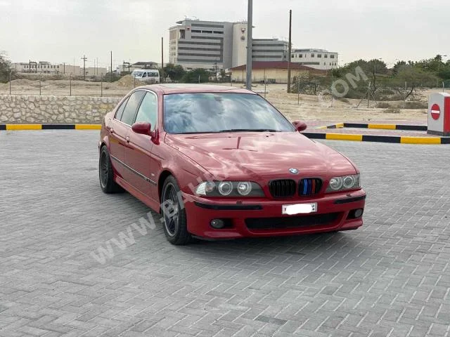 BMW  M-Series  5  2002  Sedan  Manual  8  162,750  RWD  Red  Gasoline