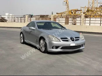 مرسيدس - بنز  اس ال كيه - كلاس  55 AMG  2006  كشف  اتوماتك  4  245,700  دفع خلفي  فضي  بنزين