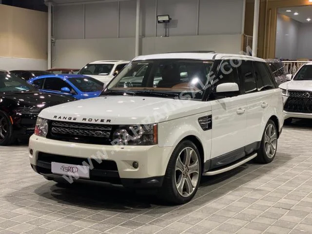 Land Rover  Range Rover  Sport Super charged  2013  SUV  Automatic  8  140,000  4WD  White  Gasoline