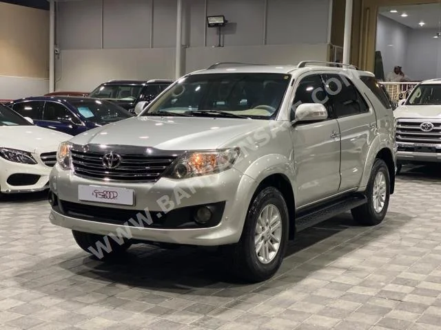 Toyota  Fortuner  2012  SUV  Automatic  4  100,000  4WD  Silver  Gasoline
