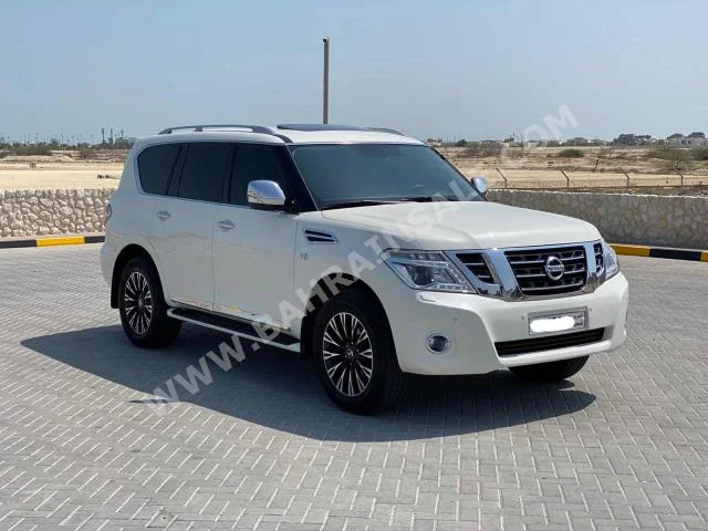 نيسان  باترول  ال اي  2018  اس يو في  اتوماتك  8  27,000  دفع كلي مستمر  أبيض  بنزين
