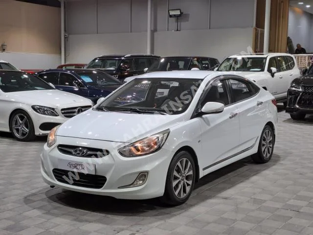 Hyundai  Accent  1.6  2013  Sedan  Manual  4  240,000  FWD  White  Gasoline