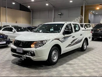 متسوبيشي  ال 200  2018  بيكب  عادي  4  60,000  دفع رباعي  أبيض  بنزين
