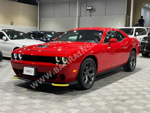 دودج  تشالنجر  2018  كوبيه \ سبورت  اتوماتك  8  90,000  دفع رباعي  أحمر  بنزين
