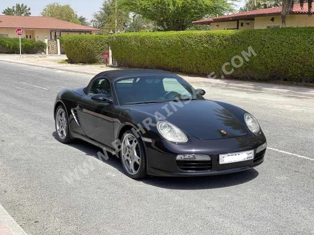 Porsche  Boxster  2005  Coupe / Sport  Automatic  6  93,150  RWD  Black  Gasoline