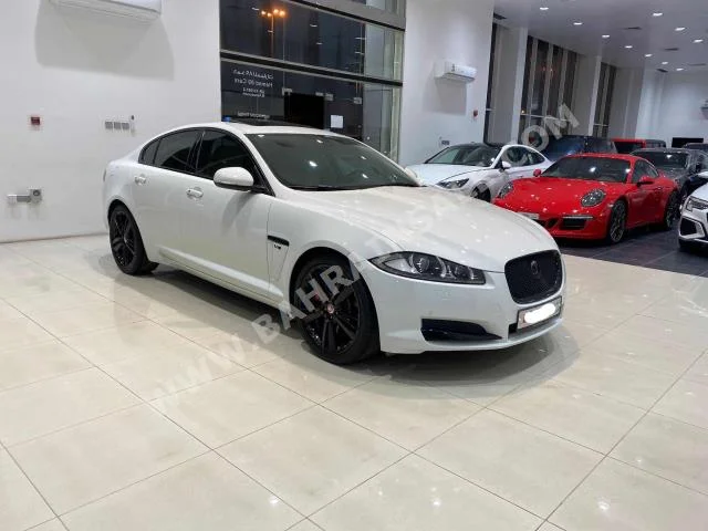 Jaguar  XF  V6 Supercharged  2015  Sedan  Automatic  6  121,250  RWD  White  Gasoline