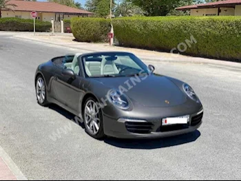 بورش  911  كاريرا  2013  كشف  اتوماتك  6  51,150  دفع خلفي  رمادي  بنزين