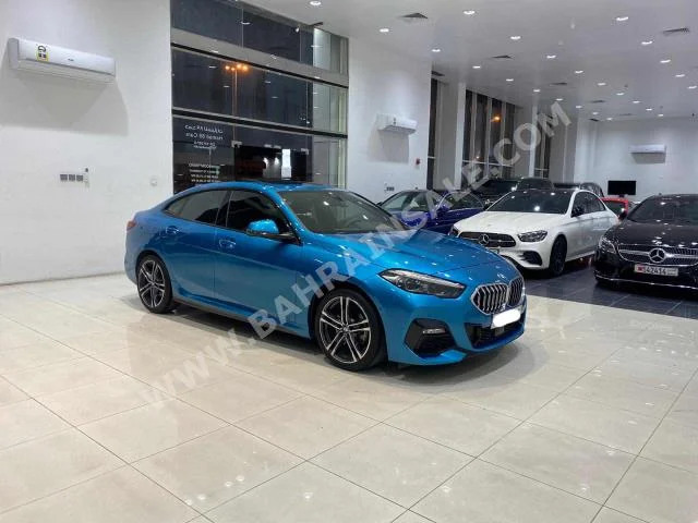 BMW  2-Series  220 i  2021  Sedan  Automatic  3  37,300  FWD  Blue  Gasoline