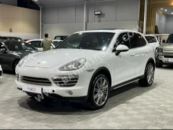 بورش  كيان  2014  اس يو في  اتوماتك  6  160,000  دفع رباعي  أبيض  بنزين