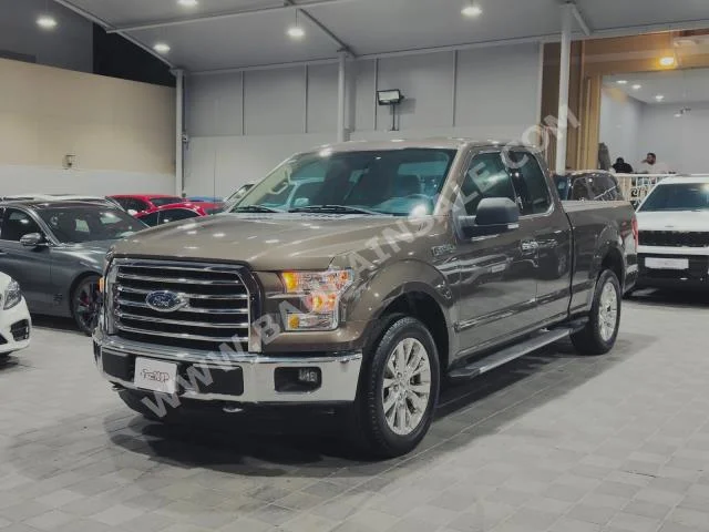 Ford  F  150  2015  Pick Up  Automatic  8  120,000  4WD  Gold  Gasoline