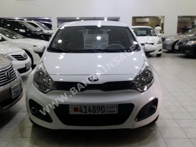 Kia  Rio  2014  Sedan  Automatic  4  45,000  FWD  White  Gasoline