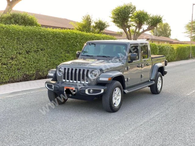 Jeep  Wrangler  2021  Pick Up  Manual  6  16,900  4WD  Gray  Gasoline