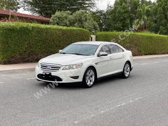 Ford  Taurus  SE  2011  Sedan  Automatic  6  205,800  FWD  White  Gasoline