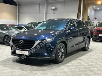 مازدا  سي اكس  9  2022  اس يو في  اتوماتك  4  40,000  دفع رباعي  أزرق غامق  بنزين