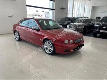 جاكوار  اكس-تايب  2009  سيدان  اتوماتك  4  82,300  دفع أمامي  أحمر  بنزين