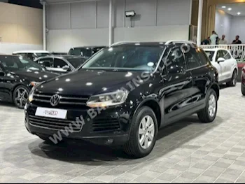 فوكس واغن  طوارق  2012  اس يو في  اتوماتك  6  130,000  دفع خلفي  أسود  بنزين