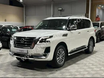 Nissan  Patrol  Platinum  2021  SUV  Automatic  6  37,000  4WD  White  Gasoline