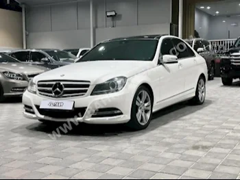 Mercedes-Benz  C-Class  200  2013  Sedan  Automatic  4  140,000  RWD  White  Gasoline
