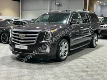 Cadillac  Escalade  2016  SUV  Automatic  8  175,000  4WD  Gray  Gasoline