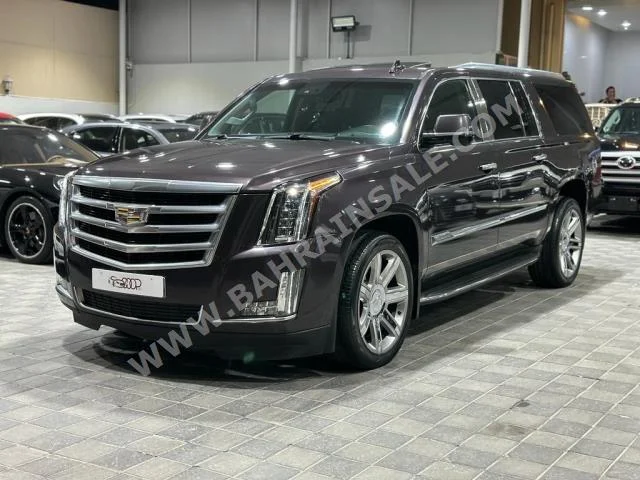 Cadillac  Escalade  2016  SUV  Automatic  8  175,000  4WD  Gray  Gasoline