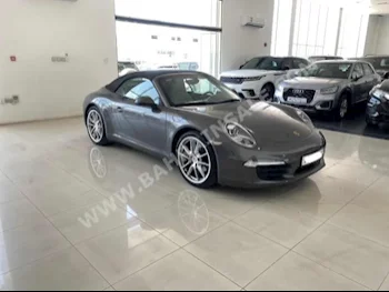 بورش  911  كاريرا  2013  كشف  اتوماتك  6  51,200  دفع خلفي  رمادي  بنزين