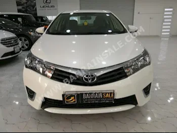 Toyota  Corolla  XLI  2014  Sedan  Automatic  4  121,000  FWD  White  Gasoline