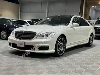 Mercedes-Benz  S-Class  63 AMG  2012  Sedan  Automatic  8  97,000  RWD  White  Gasoline