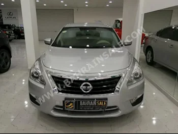 Nissan  Altima  2.5 S  2016  Sedan  Automatic  4  73,000  FWD  Silver  Gasoline