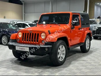 Jeep  Wrangler  Sahara  2015  SUV  Automatic  6  128,000  4WD  Orange  Gasoline