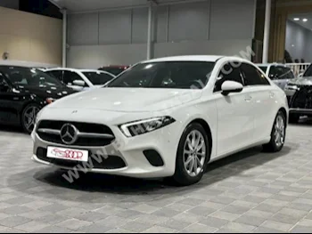 Mercedes-Benz  E-Class  200  2021  Sedan  Automatic  4  40,000  FWD  White  Gasoline