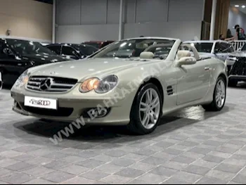 Mercedes-Benz  SL-Class  500  2007  Sedan  Automatic  8  24,000  4WD  Beige  Gasoline