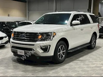 Ford  Expedition  XLT  2021  SUV  Automatic  6  64,000  4WD  White  Gasoline