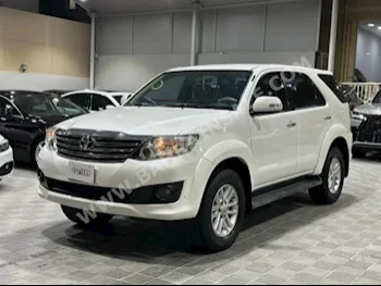 Toyota  Fortuner  2015  SUV  Automatic  4  190,000  4WD  White  Gasoline