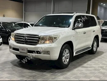 Toyota  Land Cruiser  GXR  2009  SUV  Automatic  6  230,000  4WD  Pearl  Gasoline