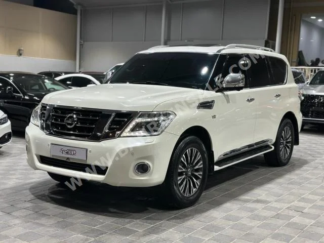 Nissan  Patrol  Platinum  2014  SUV  Automatic  8  475,000  4WD  White  Gasoline