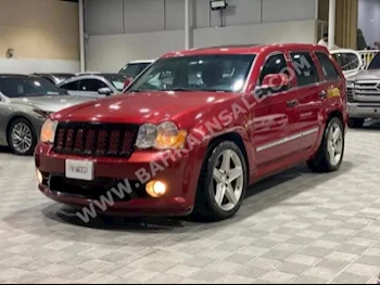 Jeep  Cherokee  Sport  2010  SUV  Automatic  8  180,000  4WD  Red  Gasoline