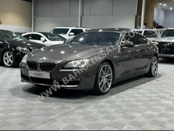 BMW  6-Series  640i  2013  Sedan  Automatic  8  176,000  RWD  Brown  Gasoline