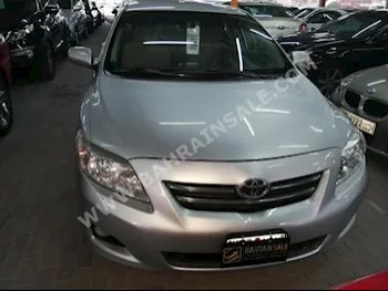 Toyota  Corolla  XLI  2009  Sedan  Automatic  4  120,000  FWD  Silver  Gasoline