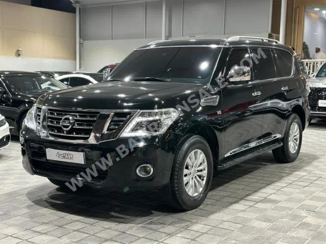 Nissan  Patrol  XE  2015  SUV  Automatic  8  215,000  4WD  Black  Gasoline