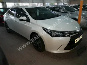 Toyota  Corolla  GLI  2016  Sedan  Automatic  4  6,000  FWD  Pearl  Gasoline