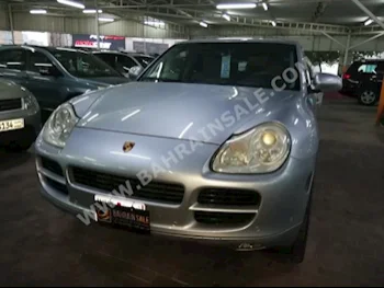 Porsche  Cayenne  2005  SUV  Automatic  6  147,000  RWD  Silver  Gasoline