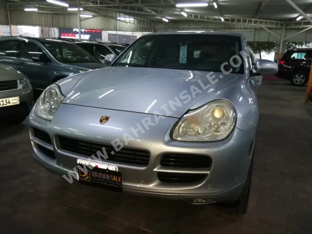 Porsche  Cayenne  2005  SUV  Automatic  6  147,000  RWD  Silver  Gasoline