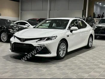 Toyota  Camry  LE  2023  Sedan  Automatic  4  0  FWD  White  Gasoline