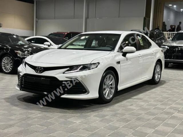 Toyota  Camry  LE  2023  Sedan  Automatic  4  0  FWD  White  Gasoline